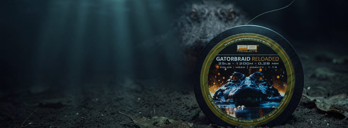 Gator Braid Reloaded spool on a dark lake bed with a crocodile behind it